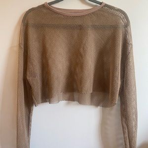 Beige mesh crop top.